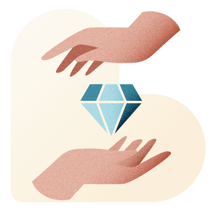 A pair of hands holding a diamond